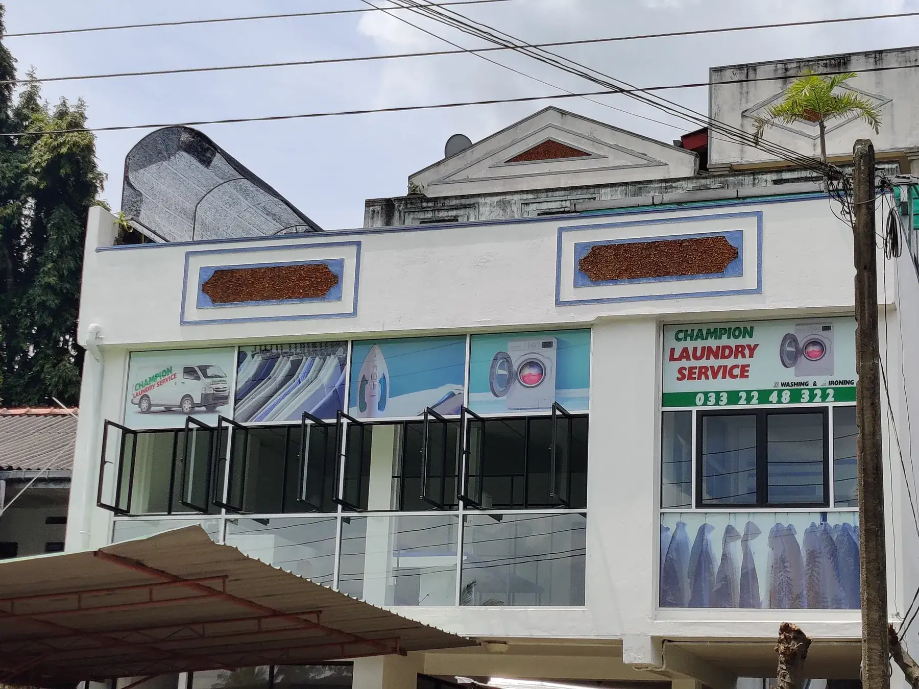 Champion Laundry Service shopfront on Kidagammulla Road, Gampaha