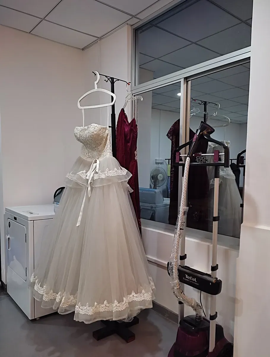 Wedding dress steamed and finished at Champion Laundry